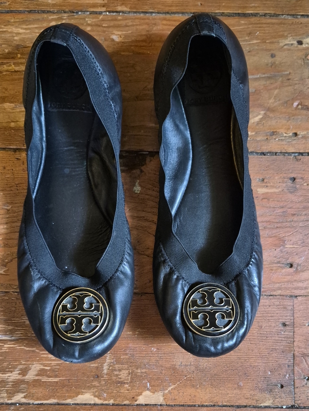 Tory Burch Black Leather Logo Ballet Flats with Gold Medallion